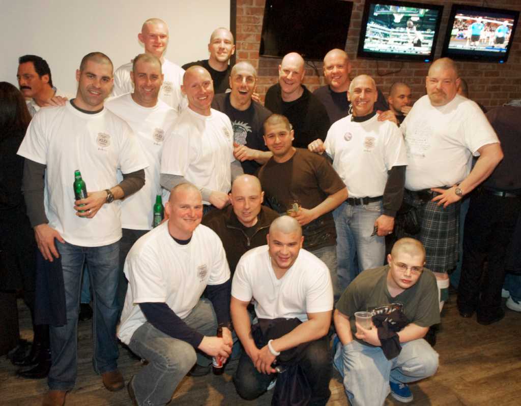 Police shave heads to raise money for cancer foundation