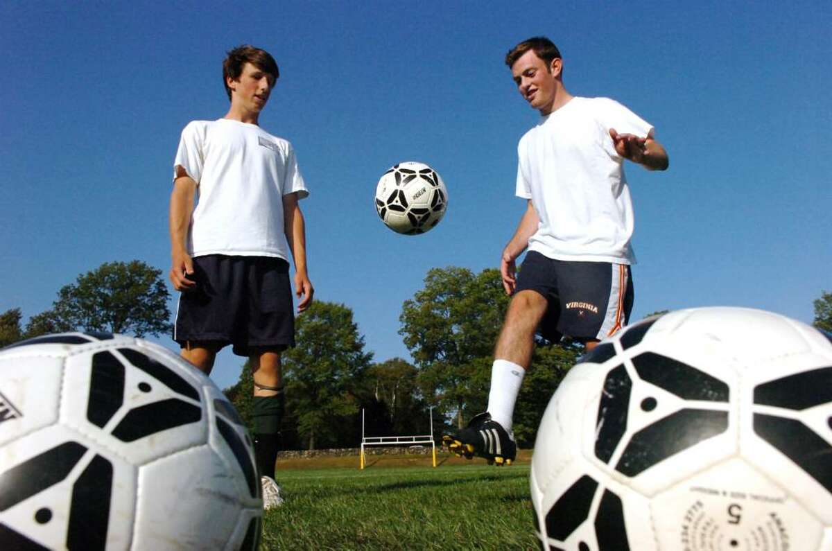The Brunswick School Bruins soccer team captains Ross Collins, left, and Ben Weisburger will lead the team this year, they practice on Friday afternoon, Sept. 18, 2009 at the school.