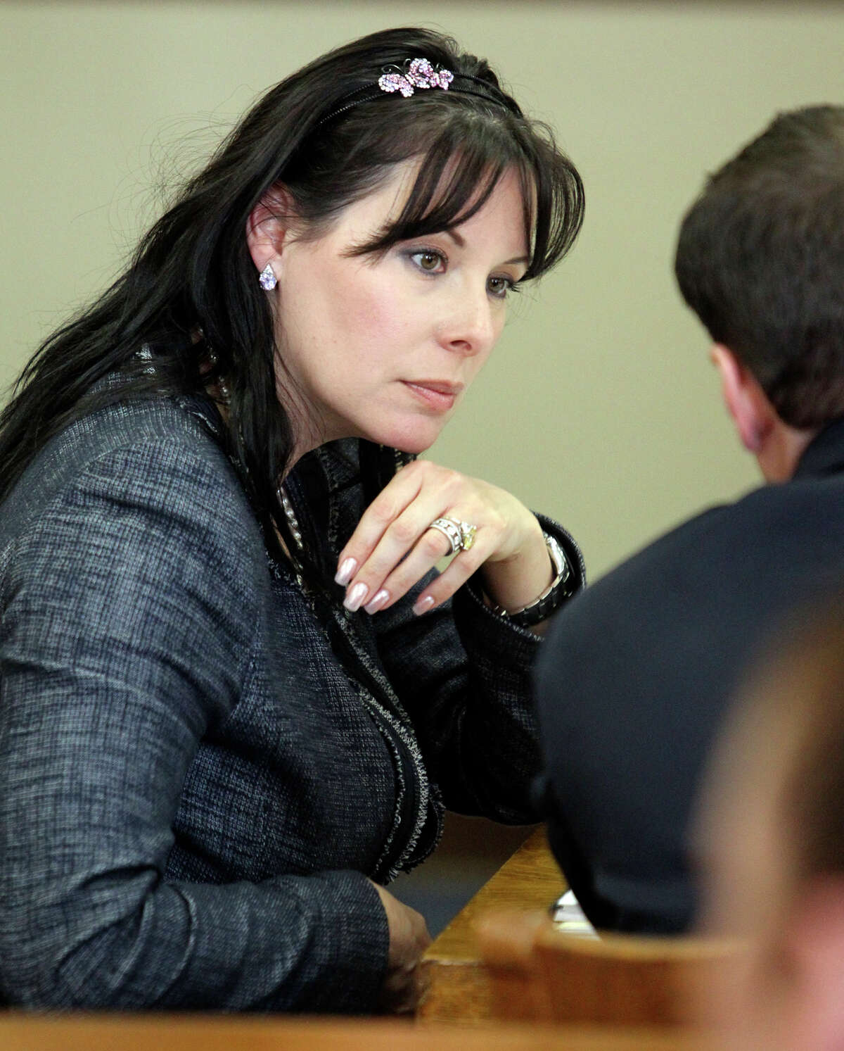 Linda Woods chats with counsel as witnesses testify in the Domonique Ramirez civil case in the 45th District courtroom at the Bexar County Courthouse.