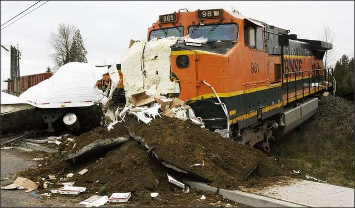 Collision with truck derails train north of Marysville