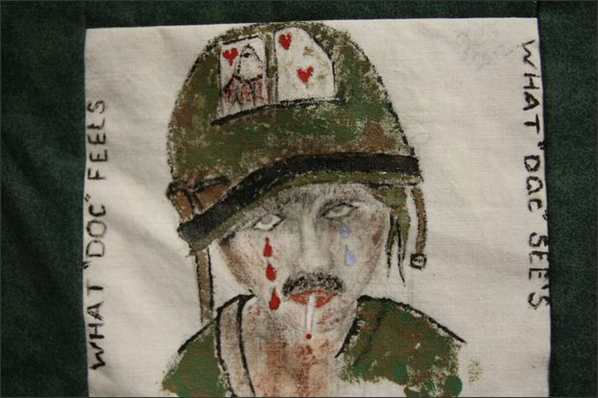 This quilt square, part of a Seattle VA hospital project created to help veterans with post-traumatic stress, depicts the sadness of a Vietnam medic.