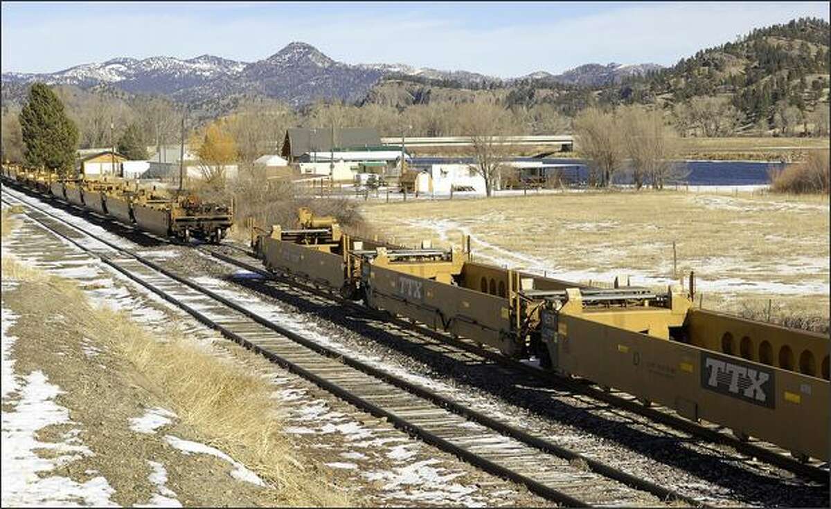 Rail cars have been parked beside the Missouri River between Great Falls and Helena, Mont., for about three months.
