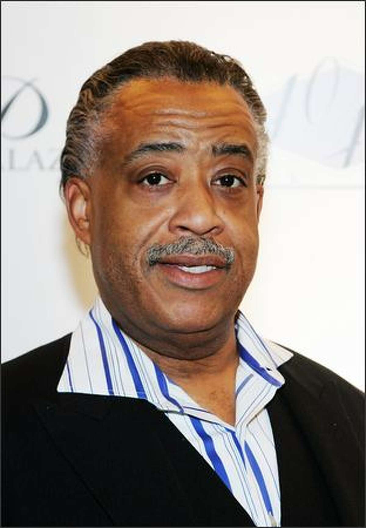 The Rev. Al Sharpton arrives at the opening of Jay-Z's 40/40 Club.