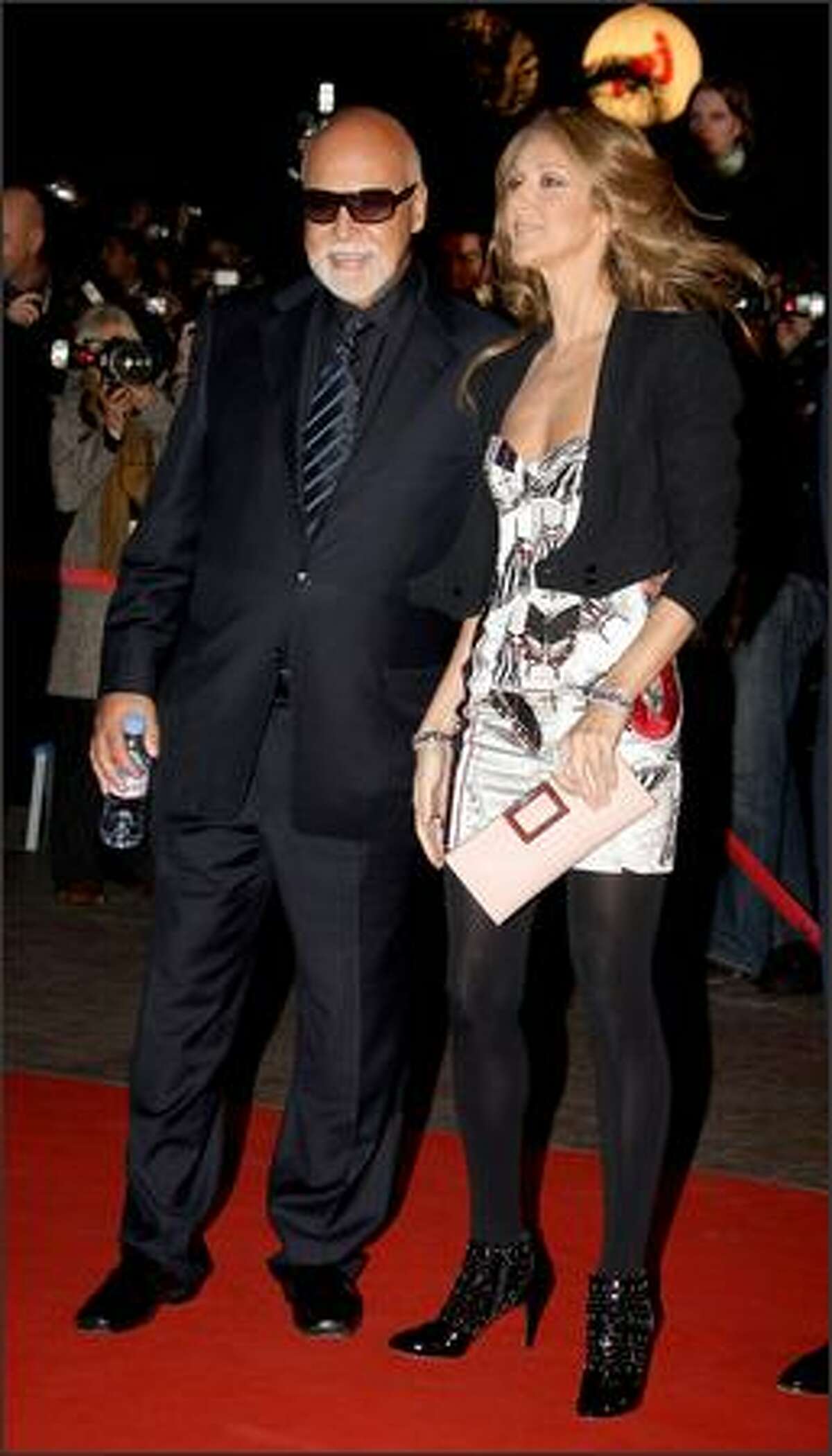 Singer Celine Dion and husband Rene Angelil attend.