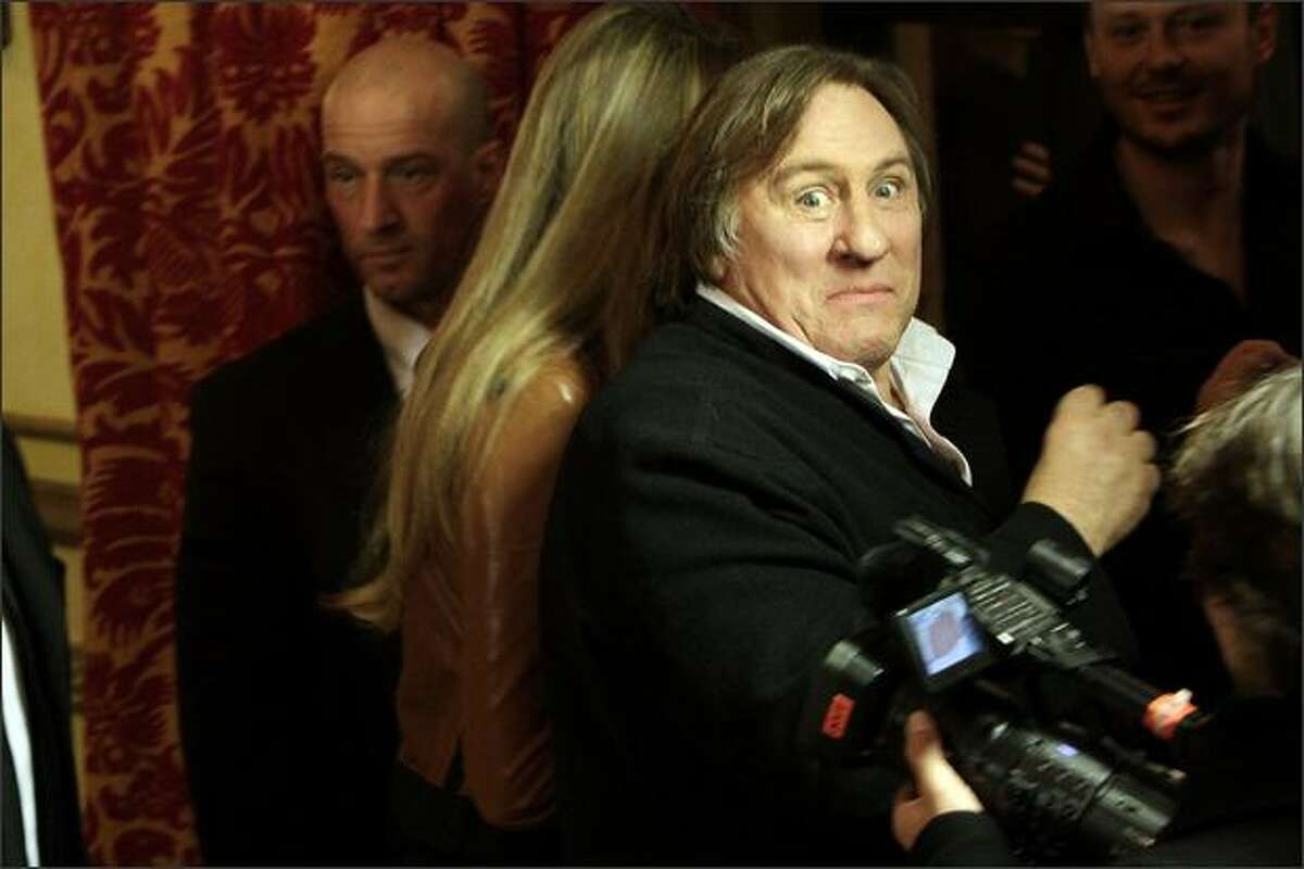 Actors Gerard Depardieu and Vanessa Hessler attend the 'Asterix at the Olympic Games' Italian Photocall at the St. Regis Hotel, Monday, in Rome, Italy.