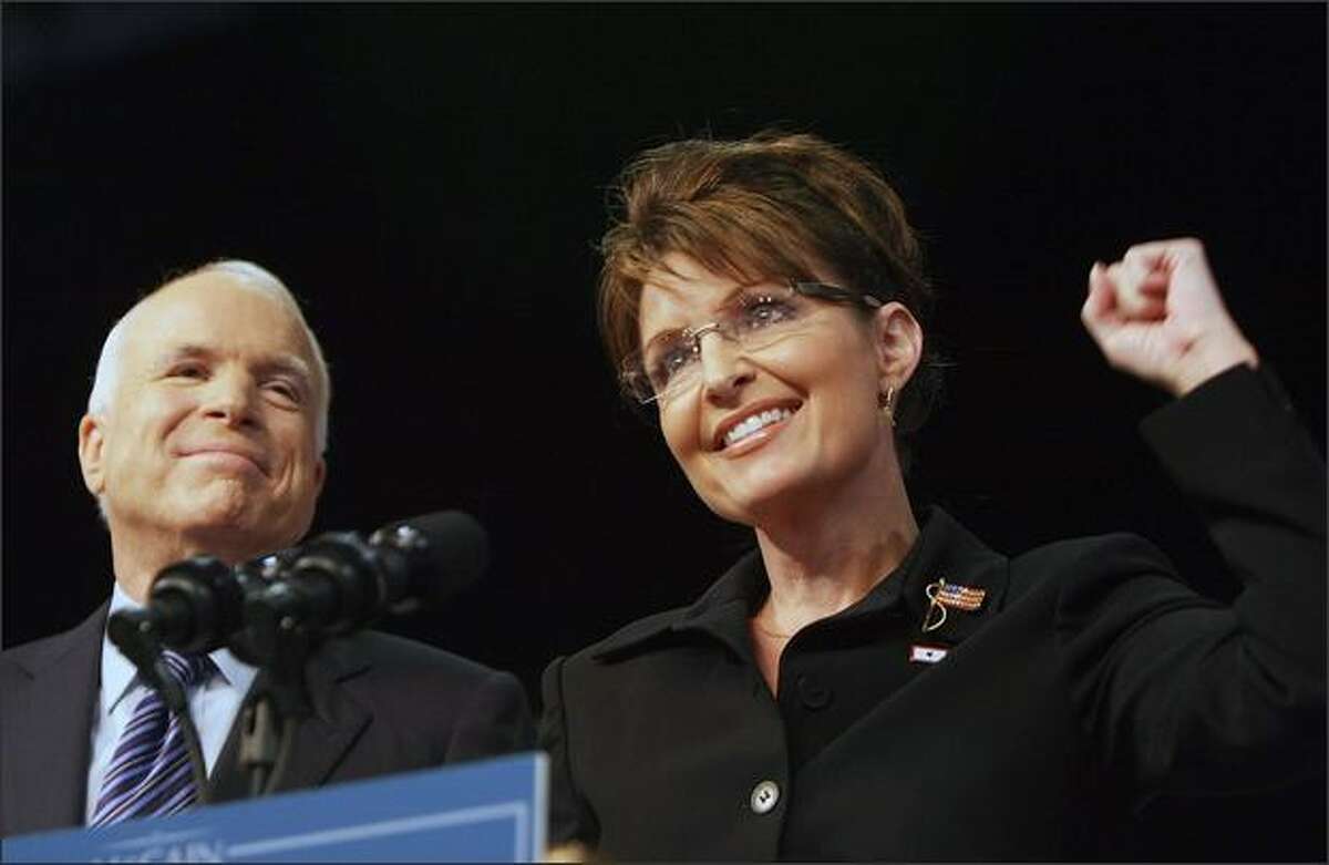 Republican presidential candidate John McCain, R-Ariz., stands with new vice presidential candidate Alaska Gov. Sarah Palin in Dayton, Ohio.