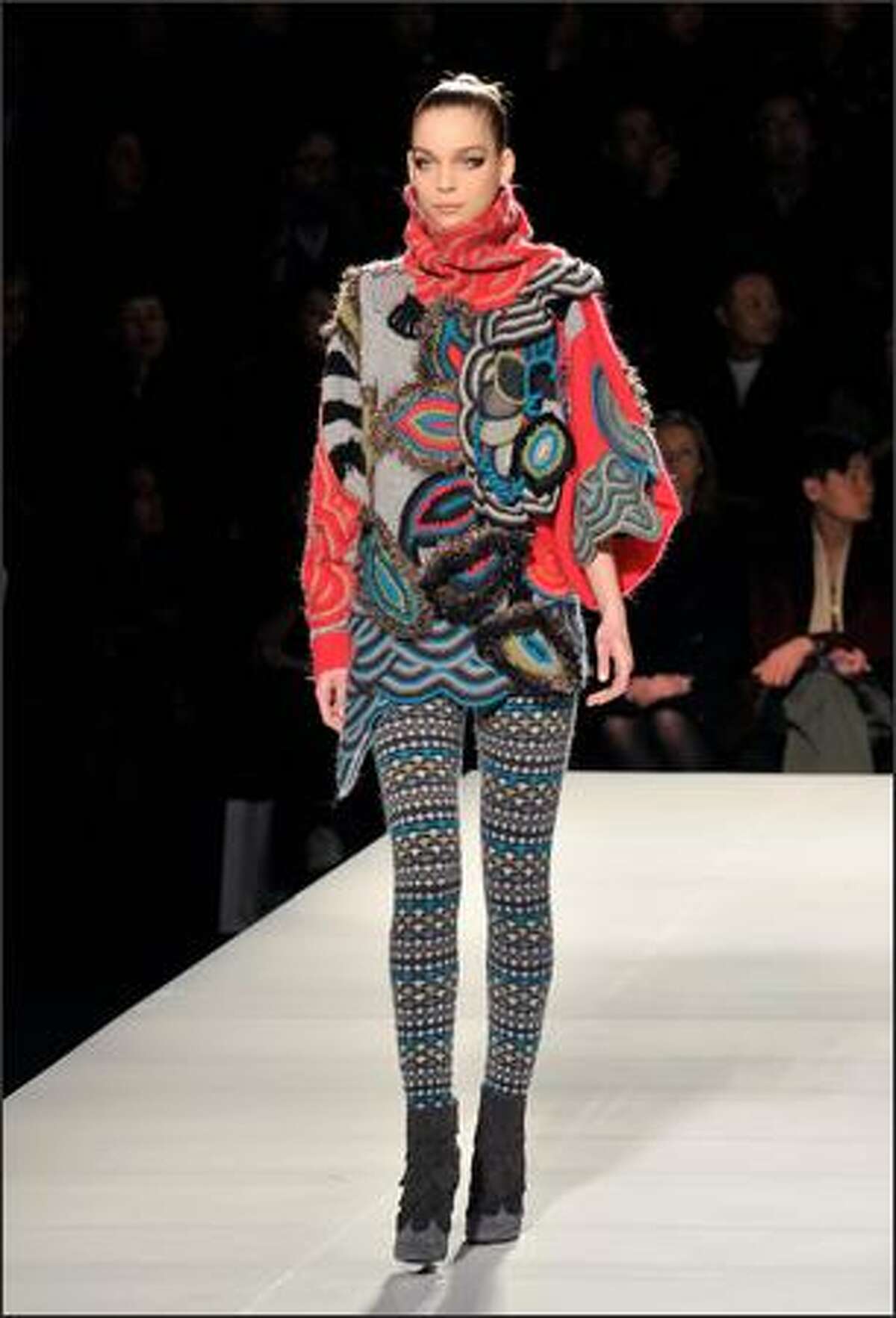 A model presents a creation by Antonio Marras for Kenzo.