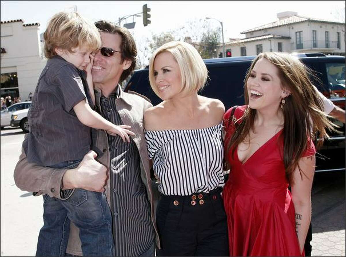 (L to R) Evan Asher, son of Jenny, actors Jim Carrey, Jenny McCarthy and Jim's daughter Jane Carrey arrive at the world premiere of 20th Century Fox's "Horton Hears a Who!" at the Mann Village Theater in Los Angeles, California.