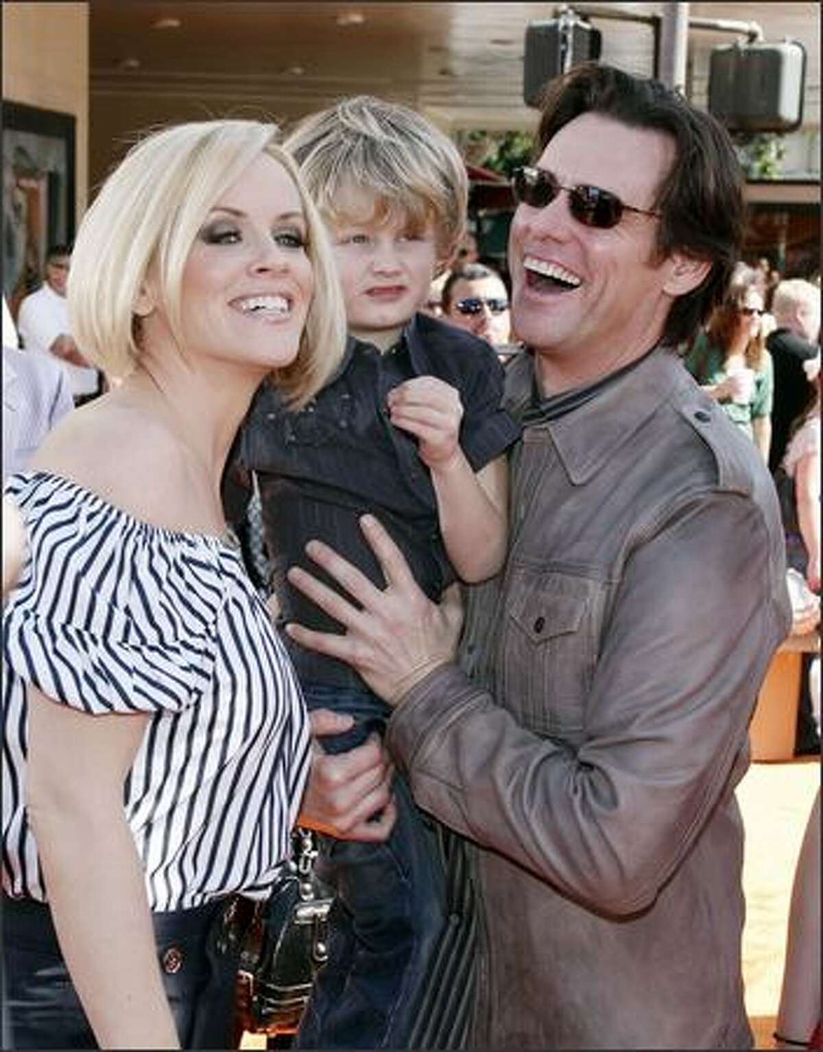 Actress Jenny McCarthy, her son Evan and actor Jim Carrey arrive at the world premiere of 20th Century Fox's "Horton Hears a Who!" at the Mann Village Theater in Los Angeles, California.