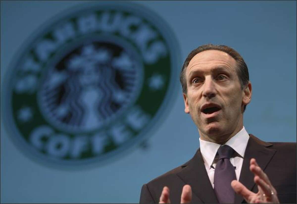 Starbucks chairman, president and CEO Howard Schultz addresses more than 6,000 shareholders gathered at McCaw Hall in Seattle for the company's Annual Meeting of Shareholders. Schultz announced 6 new initiatives intended to invigorate the company's languishing U.S. business.