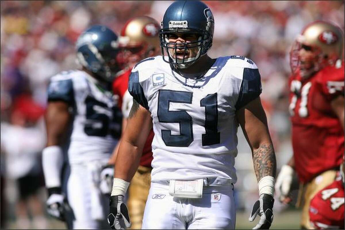 Lofa Tatupu strikes a pose after making a first quarter stop as the Seattle Seahawks beat the San Francisco 49ers 23-3 at Monster Park in San Francisco on Sunday September 30, 2007.