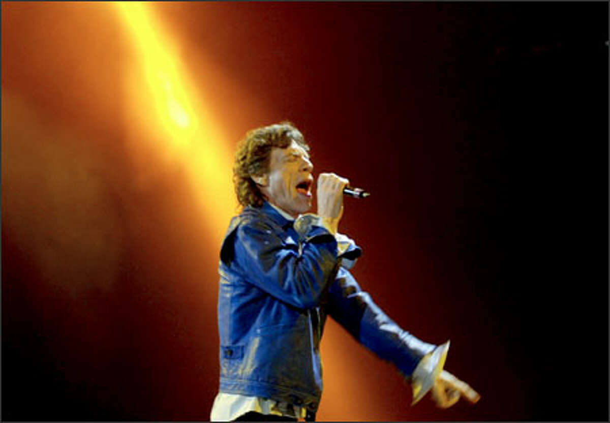 Jagger struts across the stage during the show at the Tacoma Dome.