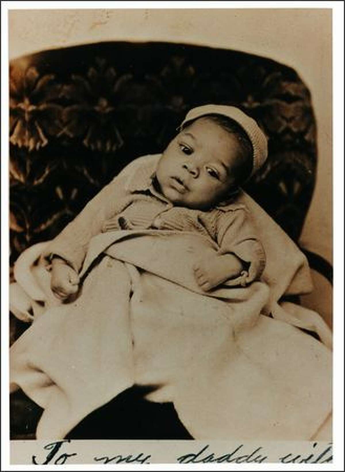 Photograph of Jimi Hendrix as a baby. Part of the the EMP's "Jimi Hendrix: An Evolution of Sound" exhibit. Photo courtesy of Experience Music Project