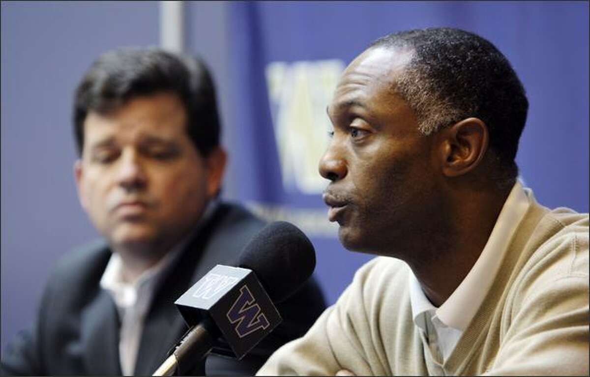 Washington coach Tyrone Willingham, right, speaks as athletic director Scott Woodward sits nearby at Willingham's regular news conference Monday8, in Seattle, where he announced that he is resigning effective at the end of the season. The embattled Washington coach fell to 0-7 on Saturday, Oct. 25, after a 33-7 loss to Notre Dame.