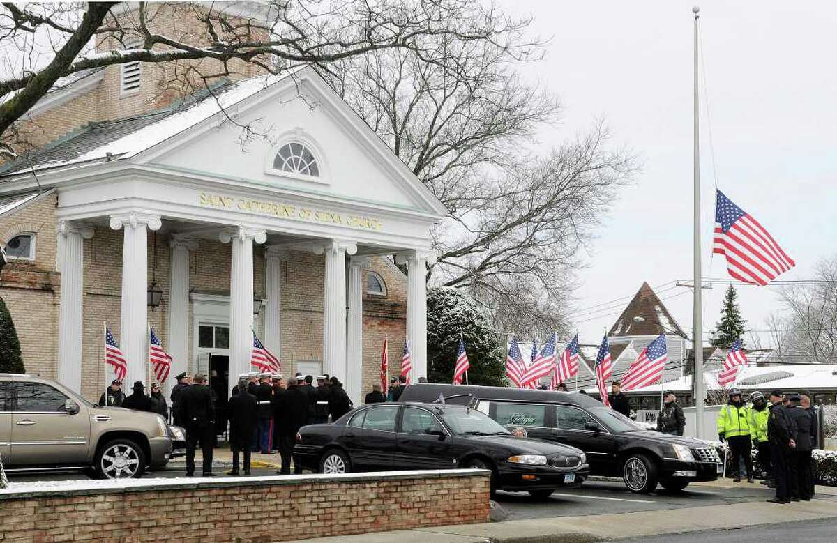 Mourners pay respects to fallen Marine