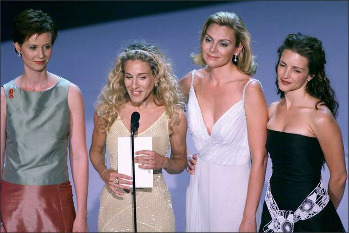 Cynthia Nixon, Sarah Jessica Parker, Kim Cattrall and Kristin Davis appear at the 1999 Emmy Awards held in Los Angeles, Sept. 13, 1999.