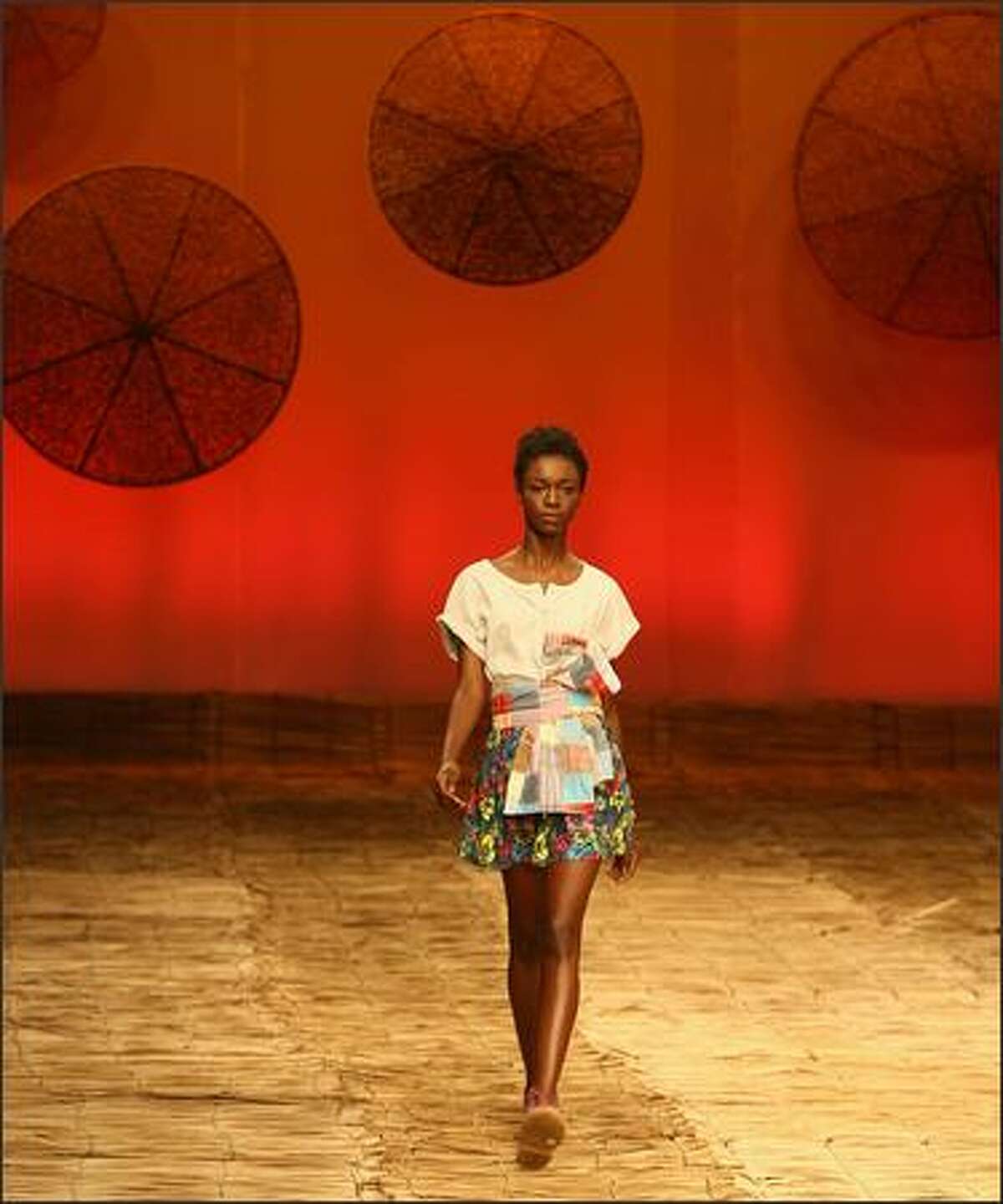 A model presents a creation by designer Teca during the Rio Fashion Week Spring-Summer 2008-09 collection, at the Marina da Gloria on Monday in Rio de Janeiro, Brazil.