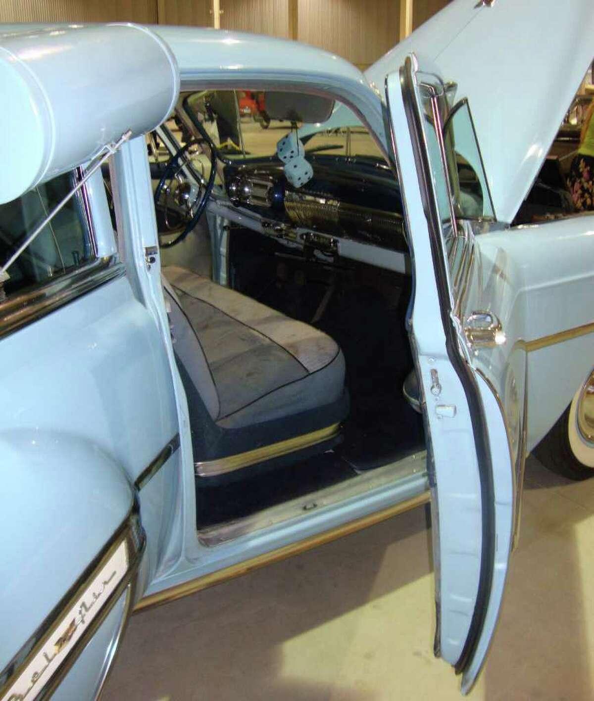This 1953 Chevrolet Bel Air four-door sedan, completed with window-mounted air cooler, is all original except for the paint. It has only 76,390 miles on it, said the owners, Chandra and Jason Fryer of San Antonio.