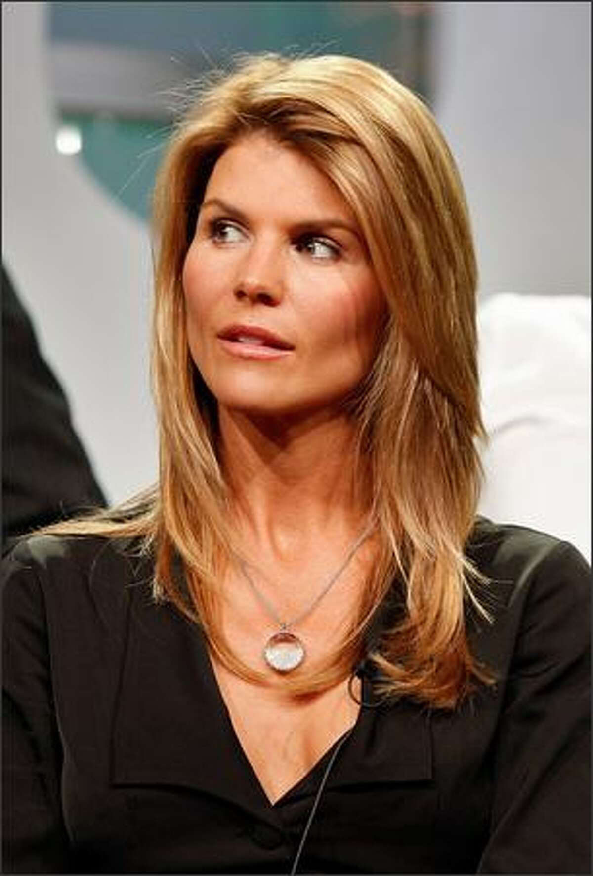 Actress Lori Loughlin of "90210" speaks during the CW portion of the Television Critics Association Press Tour held at the Beverly Hilton Hotel in Beverly Hills, Calif., on Saturday.