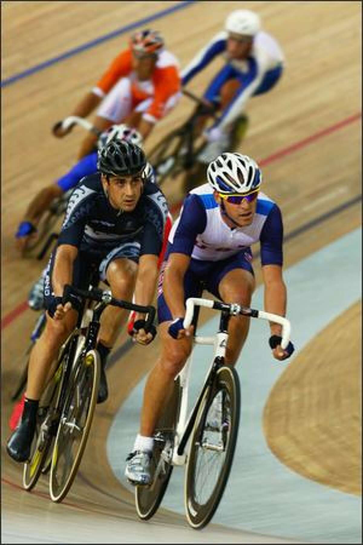 Competitors cycle in the Men's Madison at the Laoshan Velodrome on Day 11 of the Beijing 2008 Olympic Games on Tuesday.