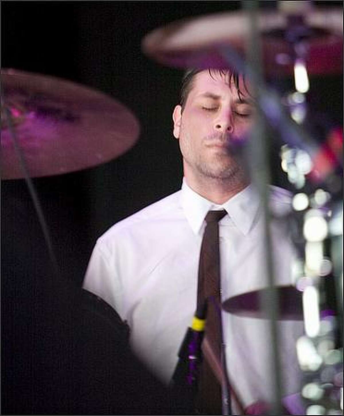 The Liars drummer Julian Gross feels the beat as they were the opening act for Radiohead at White River Amphitheatre.