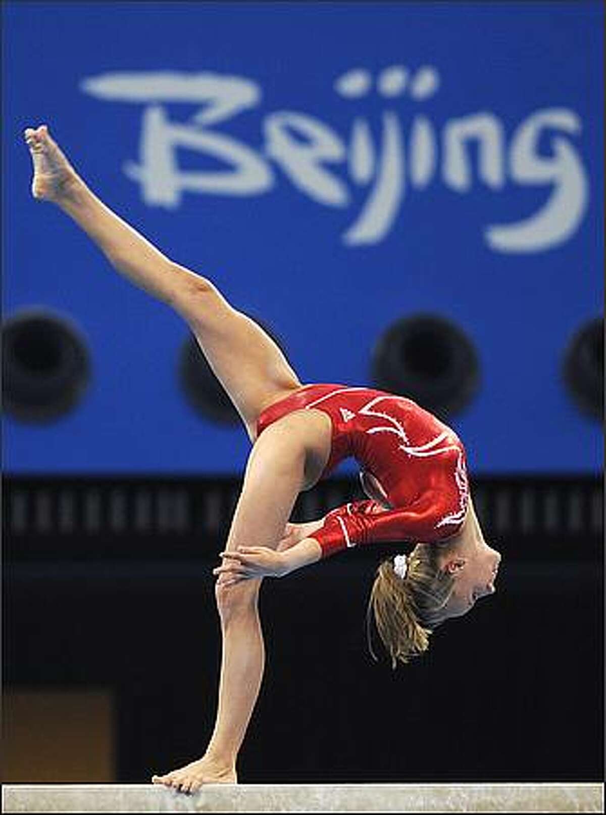 United States' Nastia Liukin competes on the balance beam during the women's team final of the artistic gymnastics event of the Beijing 2008 Olympic Games in Beijing. China won the gold, while United States won the silver and Romania the bronze. (Photo FRANCK FIFE/AFP/Getty Images)