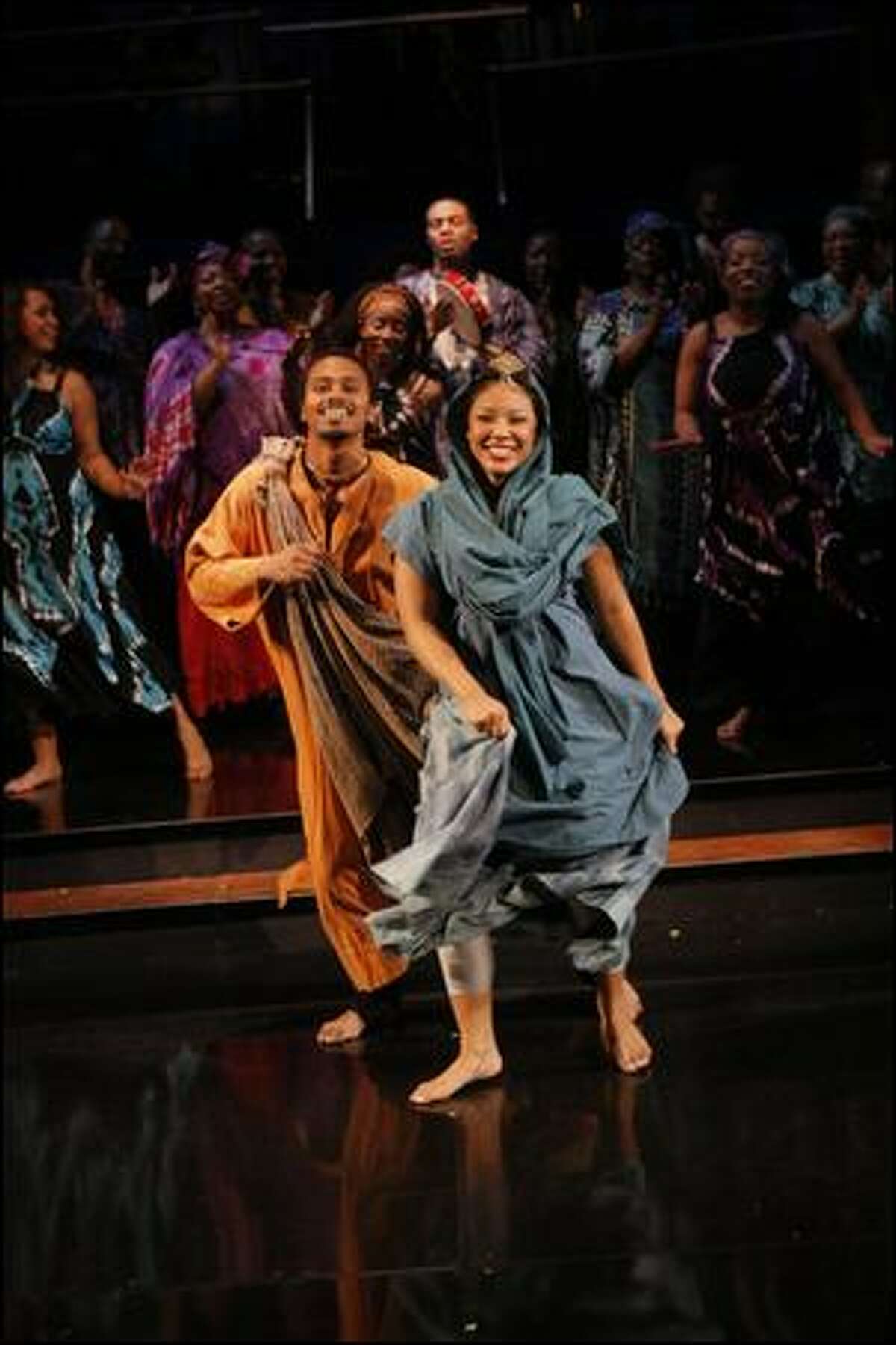 Bojohn Diciple and Pamela Yasutake dance as Joseph and Mary in Intiman's joyous production of Langston Hughes' "Black Nativity."