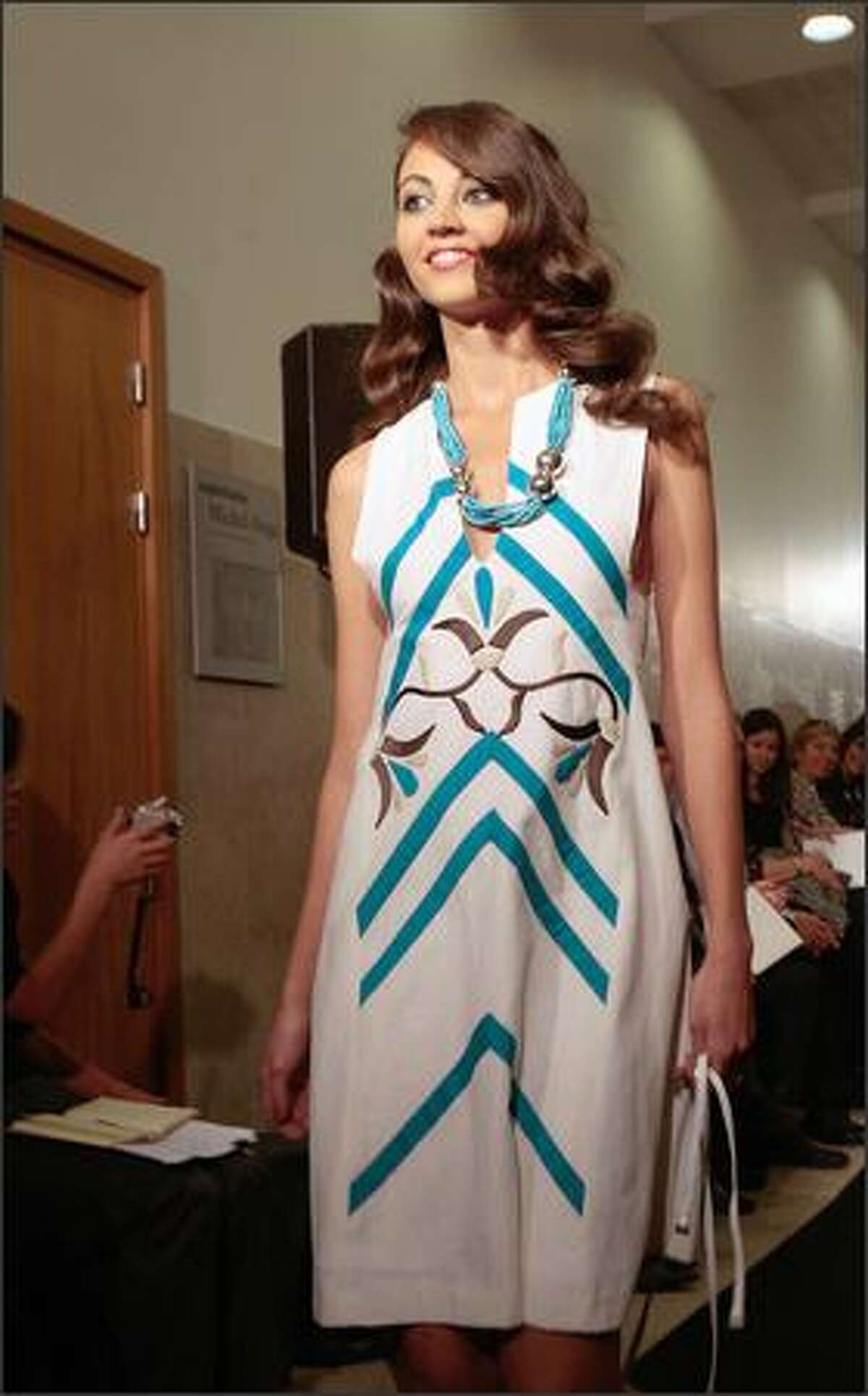A model presents a creation by Egyptian designer Marie Bishara.