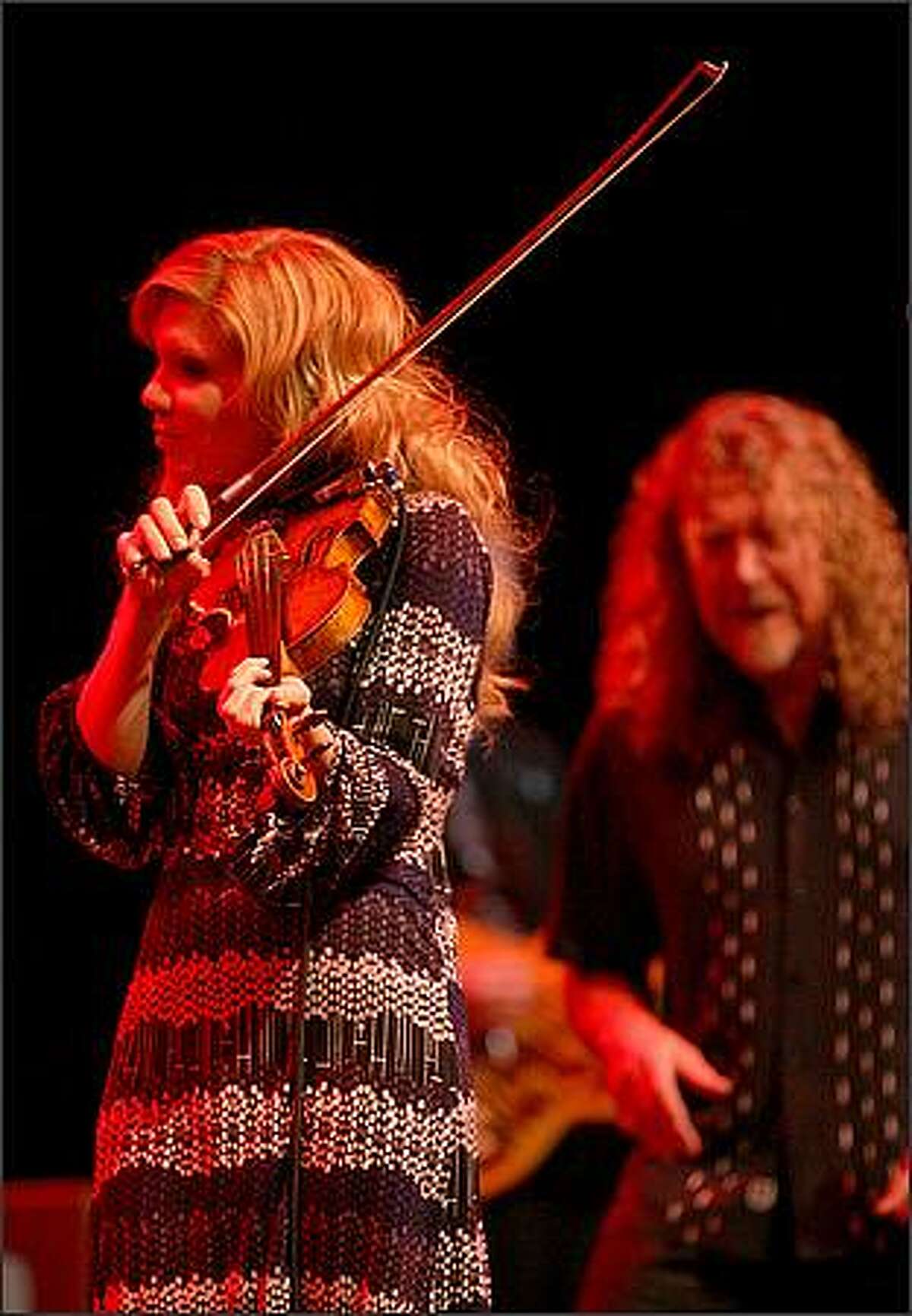 Robert Plant and Alison Krauss perform together at the WaMu Theater in Seattle on Wednesday.