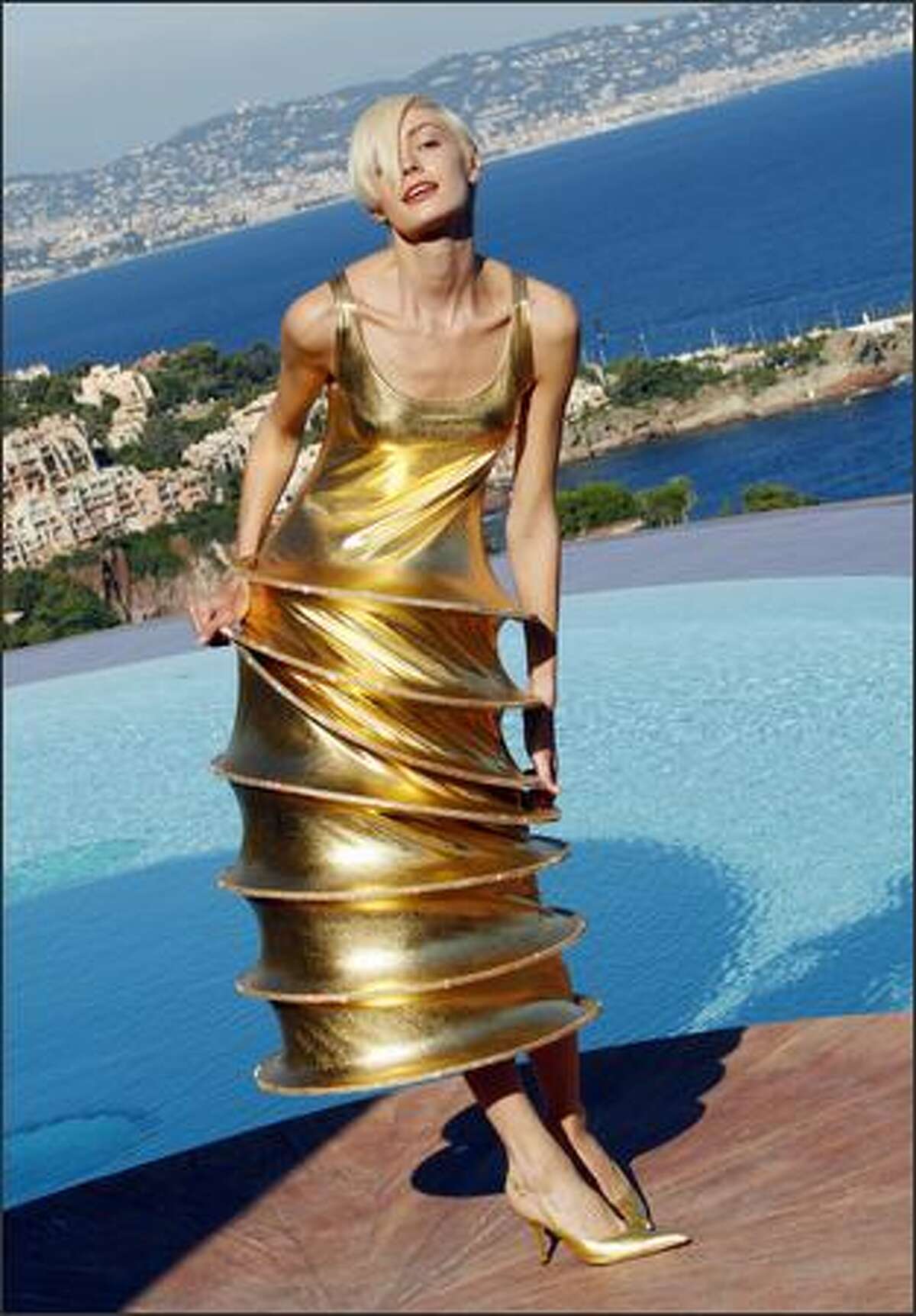 A model presents a creation by French designer Pierre Cardin during the presentation of his entire Spring-Summer 2009 and Autumn-Winter 2009 collections in his own villa in Theoule sur Mer, southern France, on Monday.