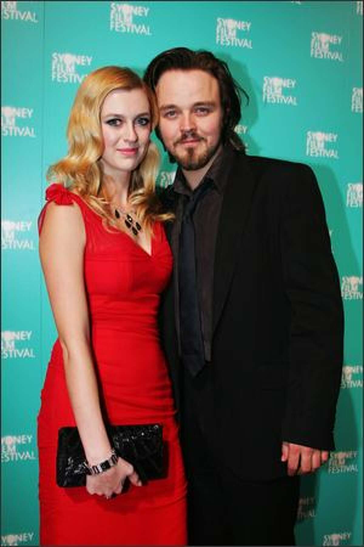 Gracie Otto and Matthew Newton attends the opening gala night and premiere of 'Happy-Go-Lucky' during the 55th Sydney Film Festival at the State Theatre on Wednesday in Sydney, Australia.