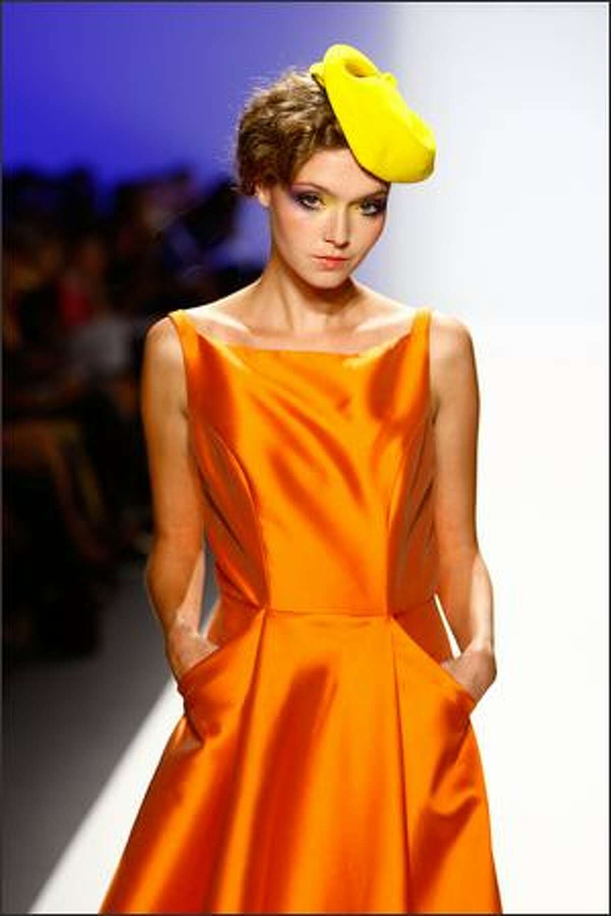 A model walks the runway at the Joanna Mastroianni show.