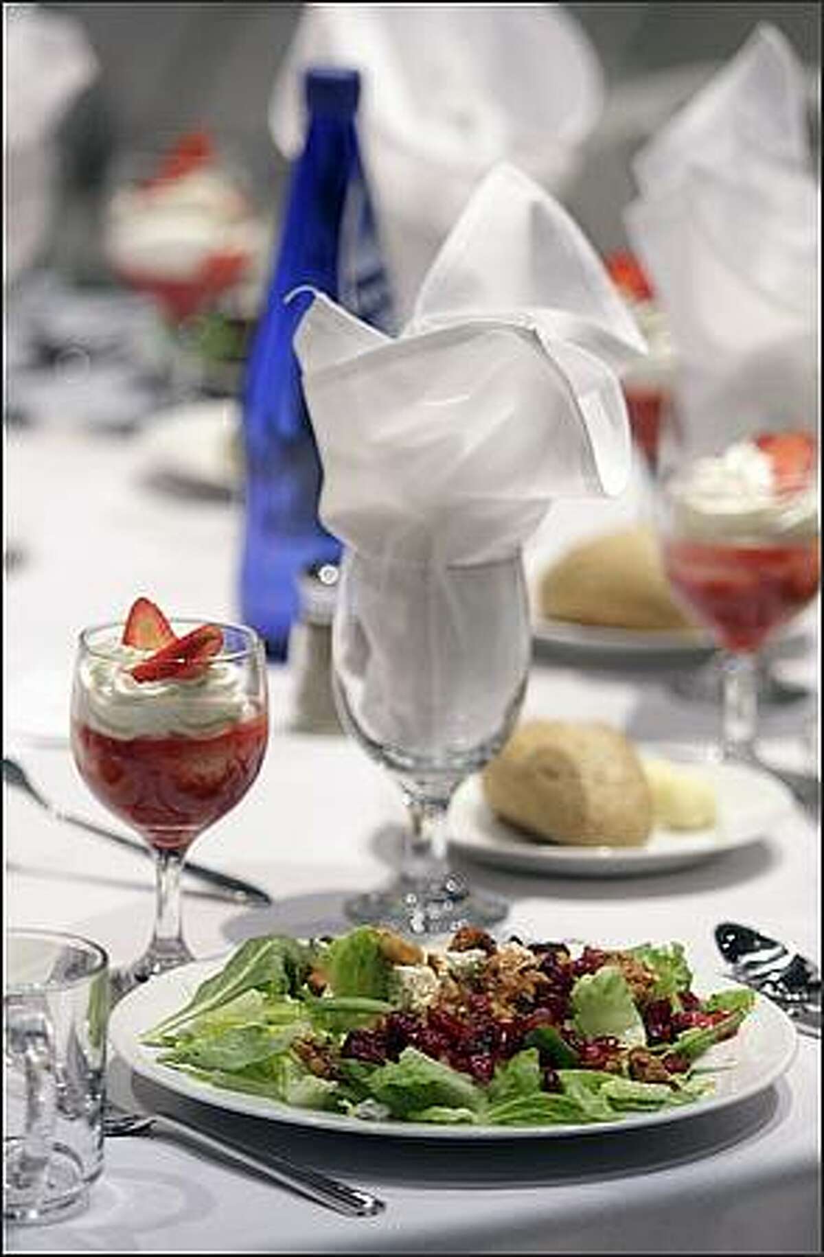 The table settings that awaited attendees at a fund raising lunch for Governor Chris Gregoire at the WaMu Theater.