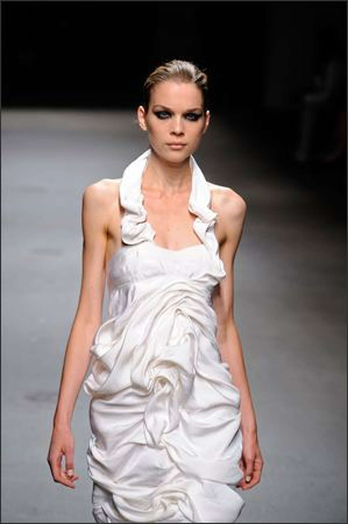 A model walks the runway at the Yigal Azrouel Spring 2009 fashion show during Mercedes-Benz Fashion Week in New York City.