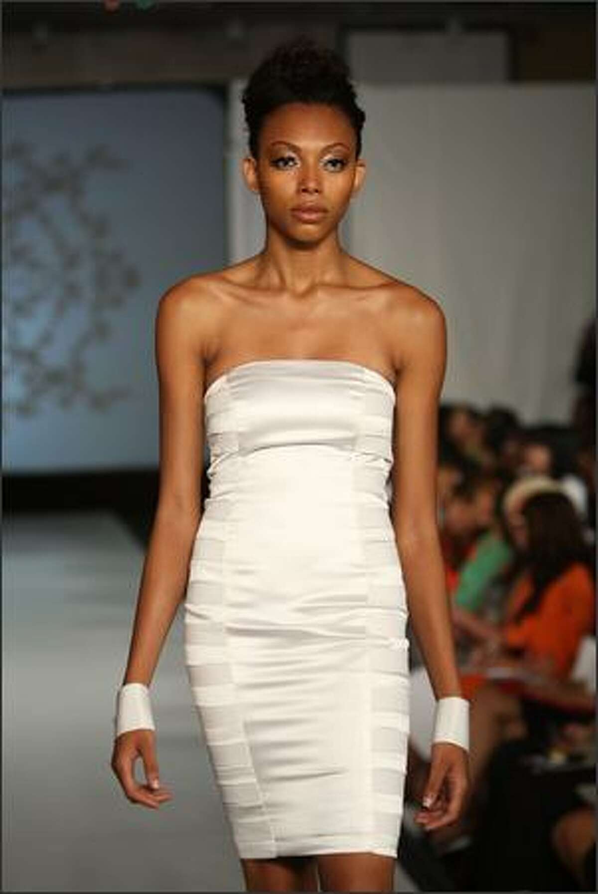 A model walks the runway at the Edwing D'Angelo Spring 2009 collection at the Westin Hotel in New York during Mercedes-Benz Fashion Week on Saturday.