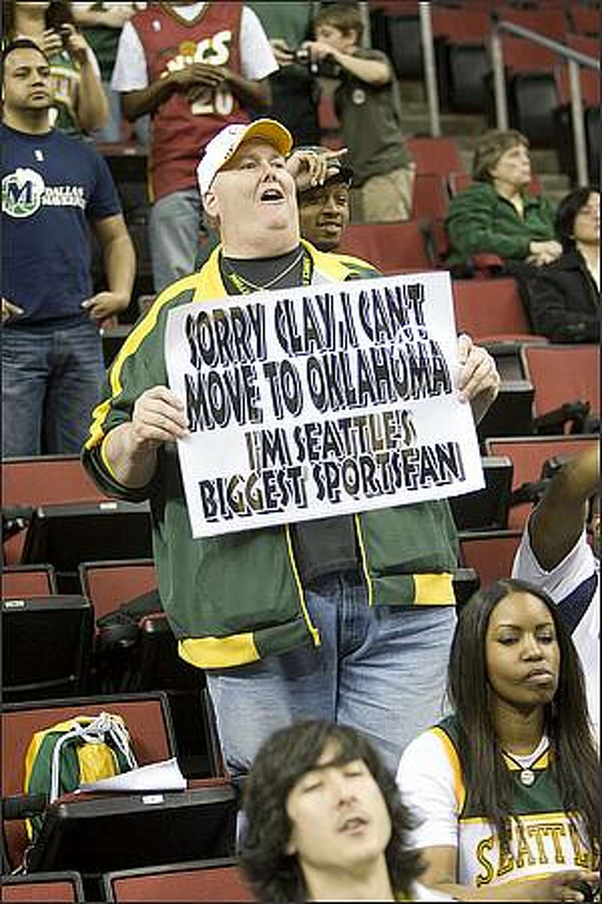 Sonics fan Lorin "Big Lo" Sandretzky shows his feelings. Sonics fans show their feelings at what might be the last game in Seattle for the SuperSonics. The SuperSonics played the Dallas Mavericks in the Key Arena, Sunday, April 13, 2008. (photo/Grant M. Haller/Seattle Post-Intelligencer)).