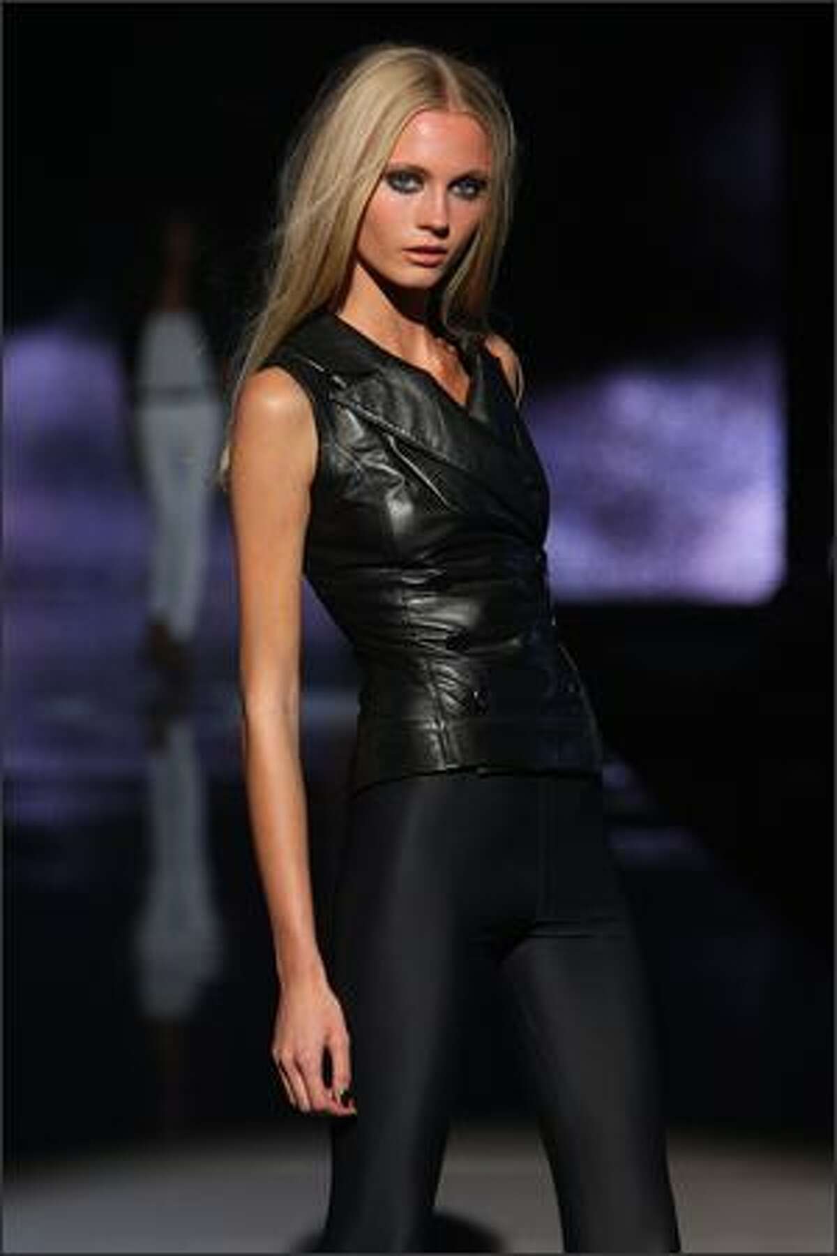 A model walks the runway at the Rock & Republic show.