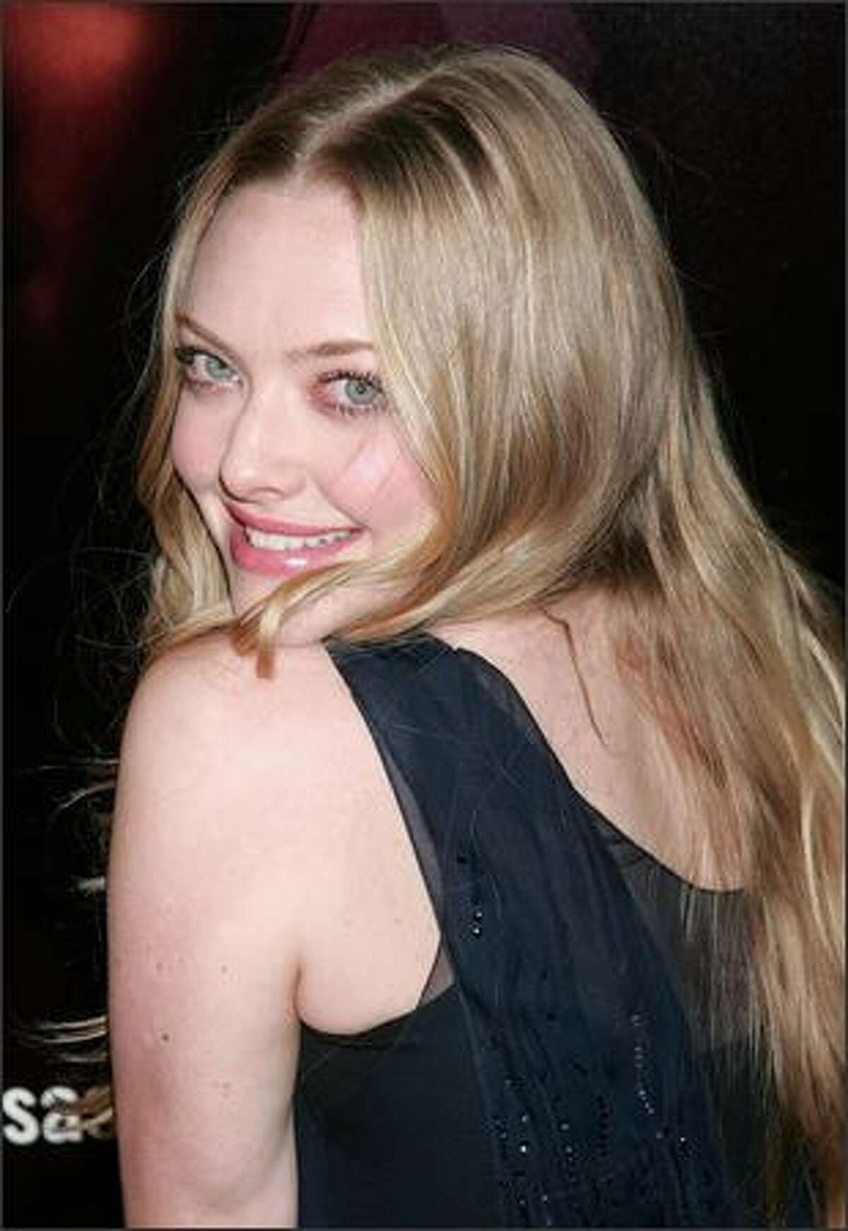 Actress Amanda Seyfried attends the premiere of HBO's "Big Love" 3rd season at the Cinerama Dome January 14, 2009 in Hollywood, California.