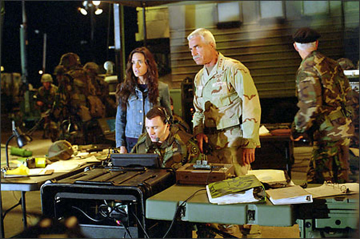 Betty Ross (Jennifer Connelly) and her father, General "Thunderbolt" Ross (Sam Elliott), disagree on how to handle the escalating situation.