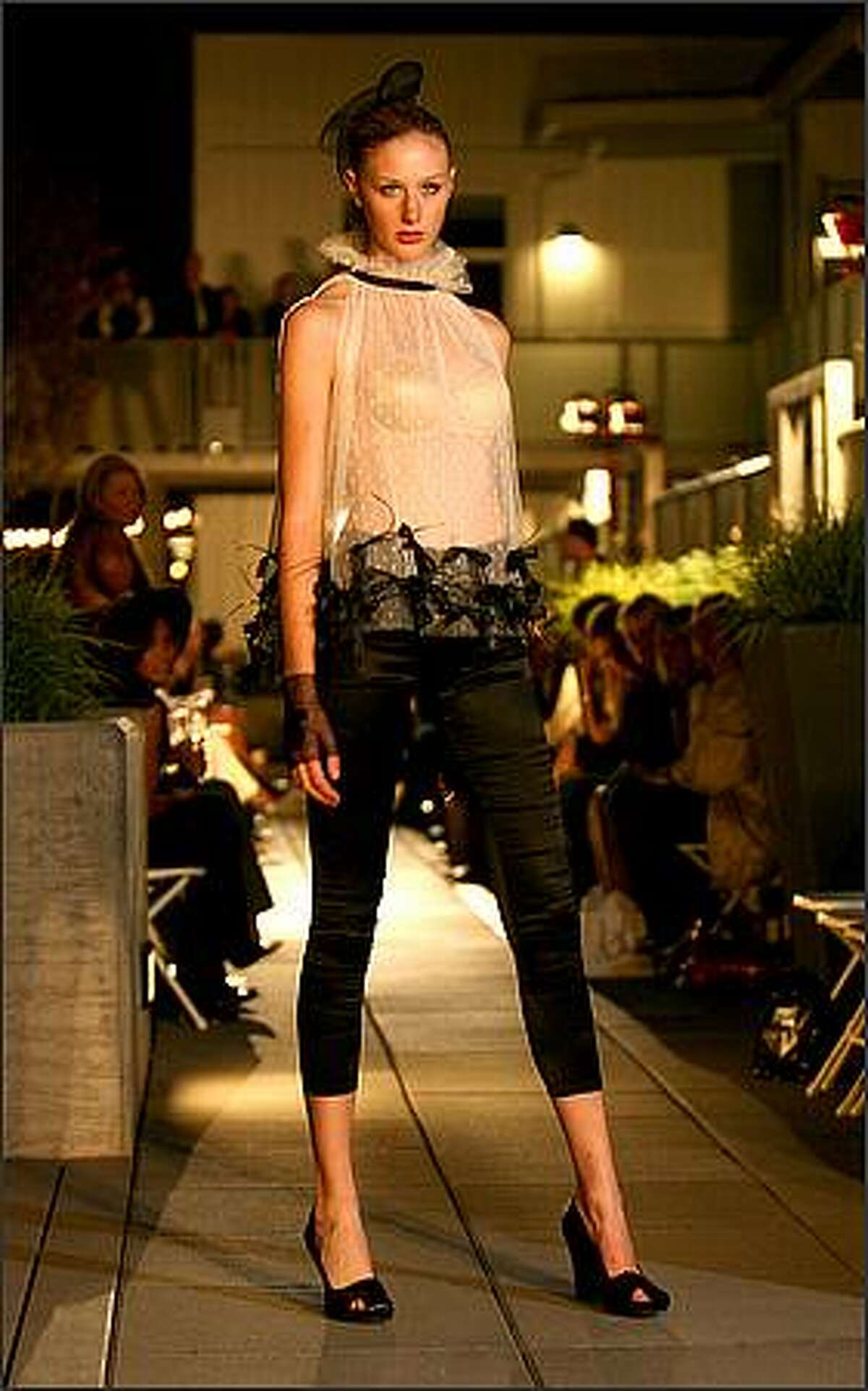 Madina Vadache unveiled her Spring 2009 ready-to-wear collection, Liquid Dreams at the Lumen Garden Courtyard in Seattle.