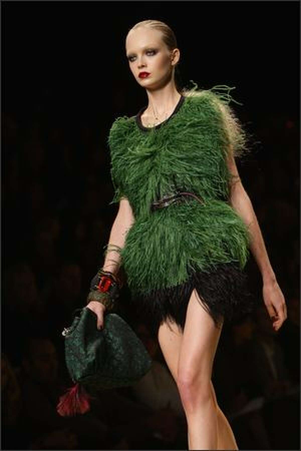 A model presents a creation by designer Marc Jacobs for Louis Vuitton during Paris Fashion Week on Sunday in Paris.