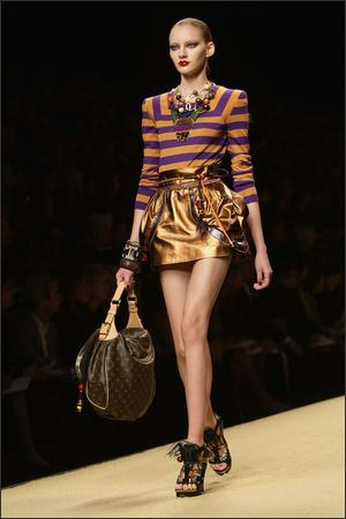 A model presents a creation by designer Marc Jacobs for Louis Vuitton during Paris Fashion Week on Sunday in Paris.