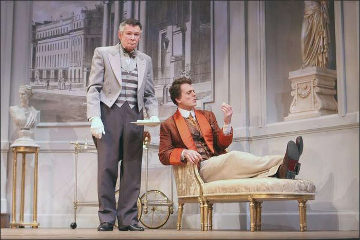"The Importance of Being Earnest," with Clayton Corzatte, left, as Lane and Jason Collins as Algernon, provides ample laughs at the Village Theatre.