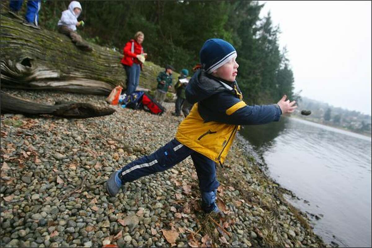 The judges award him a 9.5! Conor Manley, 6, displays excellent form – note the extension on the follow-through – skipping a rock on Lake Washington during an unstructured outing at Seward Park.
