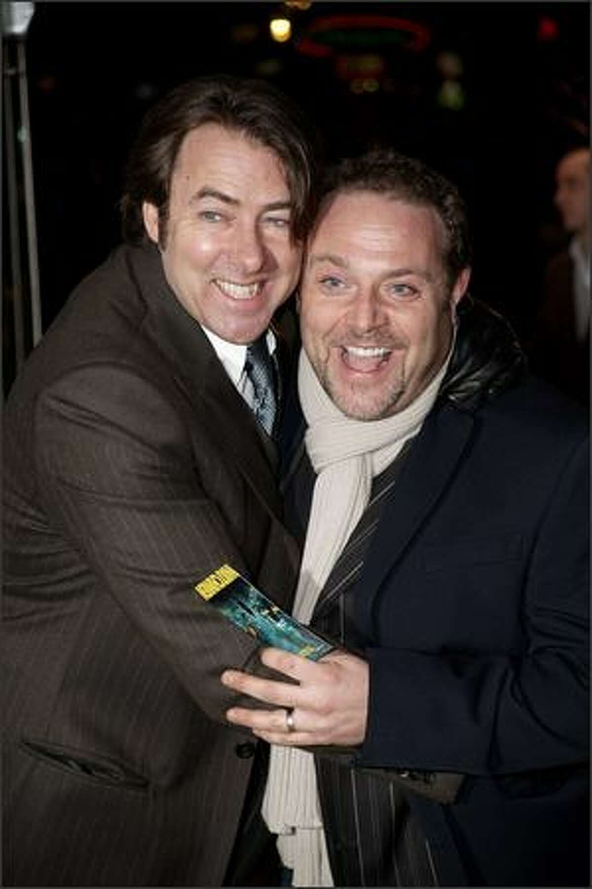 Jonathan Ross (L) and John Thompson attend the UK premiere of "Watchmen" at the Odeon, Leicester Square in London, England.