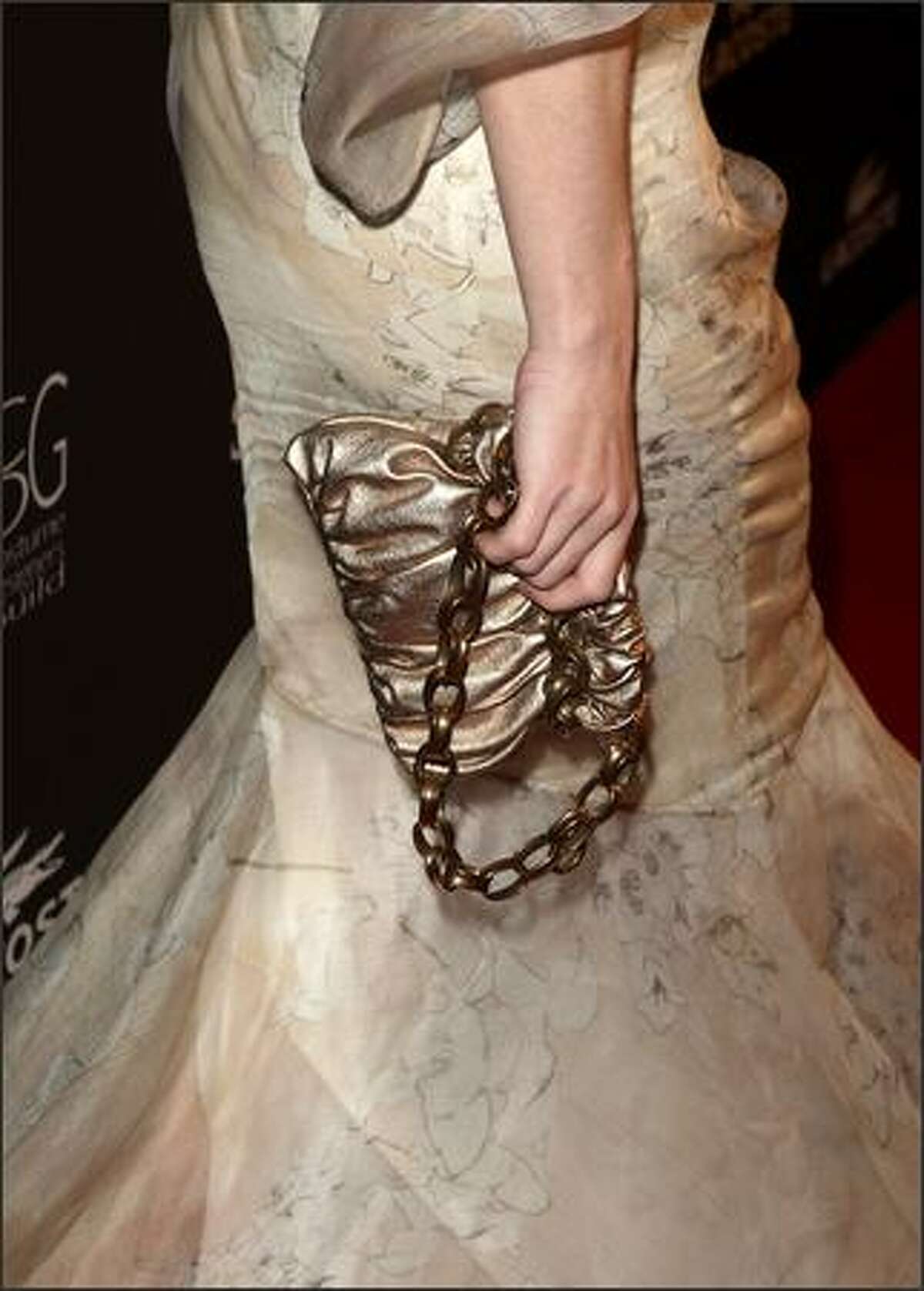 Actress Melissa George (handbag detail) arrives.