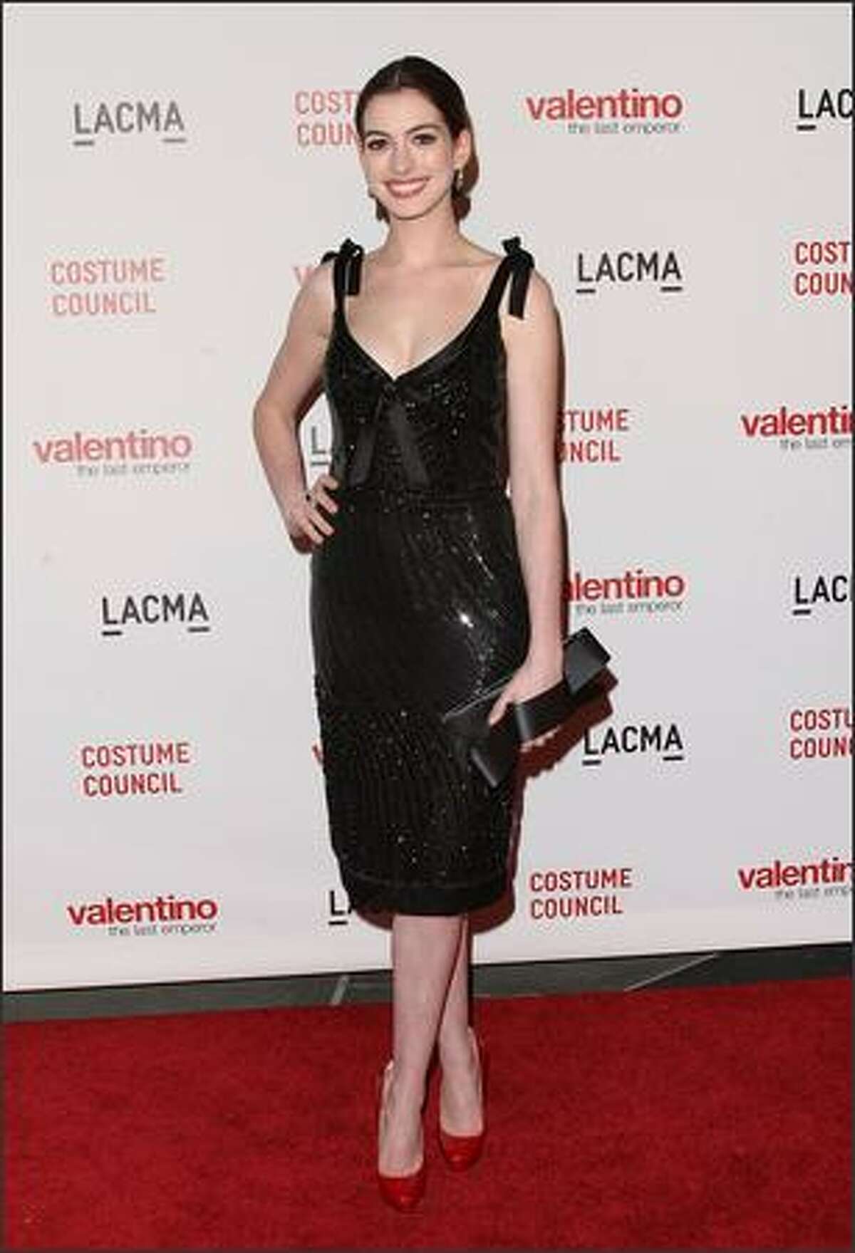 Actress Anne Hathaway attends the Los Angeles premiere of "Valentino: The Last Emperor" at the Bing Theatre at LACMA in Los Angeles, California.