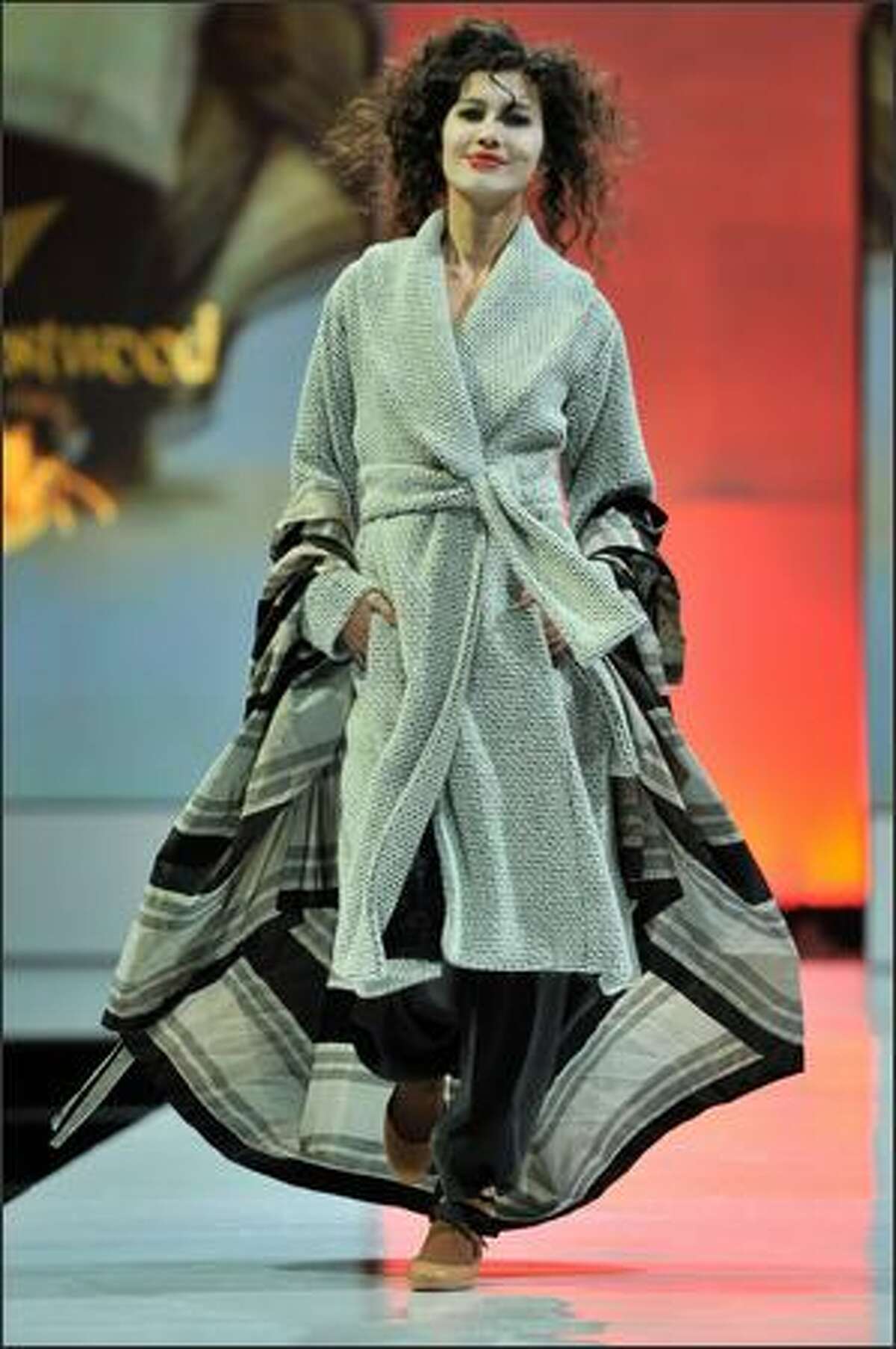 A model showcases designs by Vivienne Westwood for her Autumn/Winter 2009 collection on the catwalk at the Ngee Ann City Civic Plaza on Day 5 - and the last day - of the Audi Fashion Festival Singapore on Sunday in Singapore.