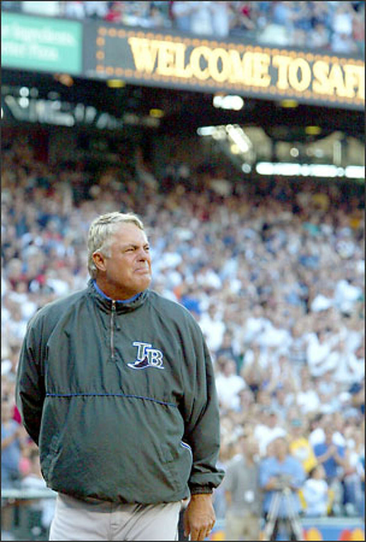 Tampa Bay Devil Rays manager Lou Piniella cries as the crowd cheers for him at Safeco Field.