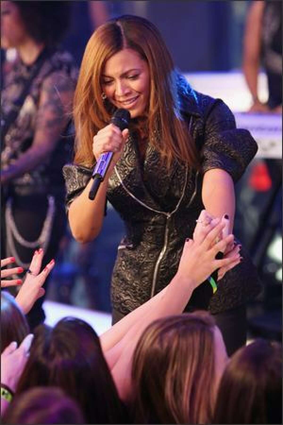 Singer Beyonce performs during MTV's TRL "Total Finale Live" at the MTV studios in Times Square on Sunday in New York.